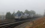AMTK 84 & 82 lead train P092-14 past the Fairgrounds in the fog
